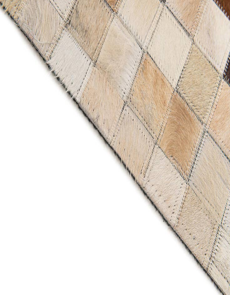 Detail image of  5' 2 x 8' 1 Cowhide Stocks Rug