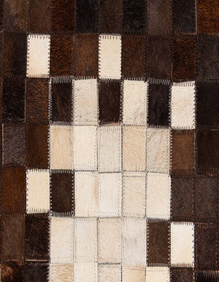Detail image of  5' 2 x 8' 1 Cowhide Stocks Rug