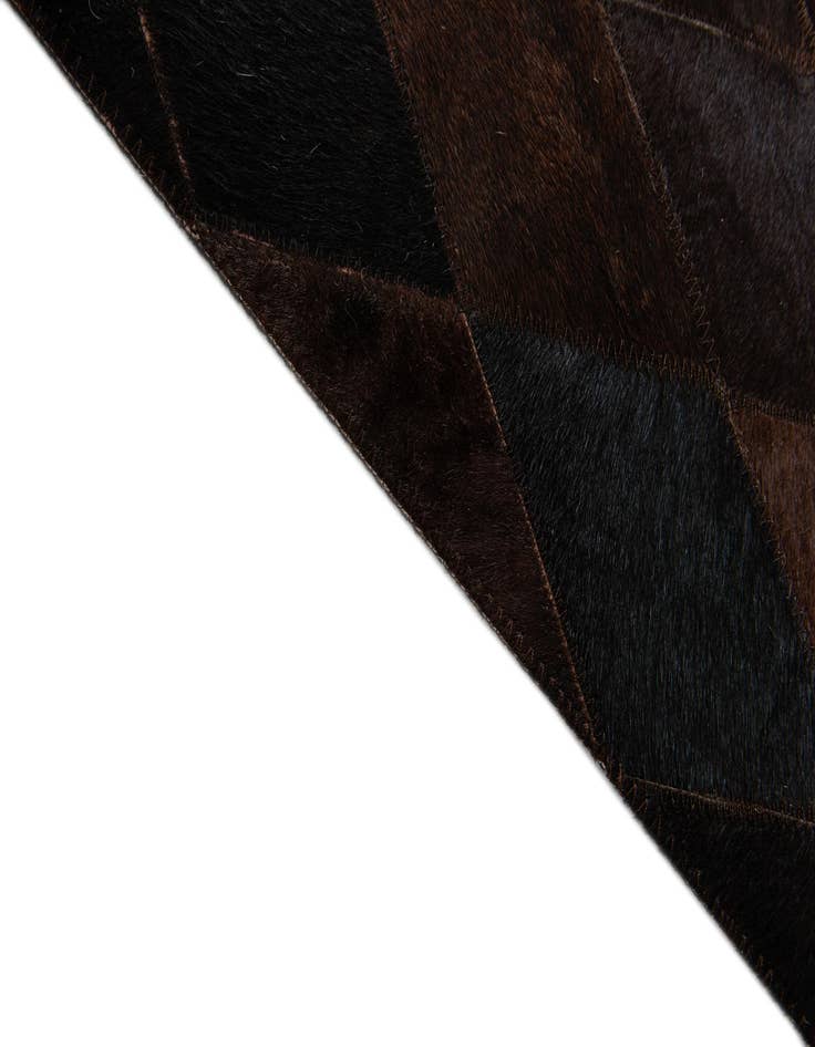 Detail image of  5' 2 x 8' Cowhide Stocks Rug