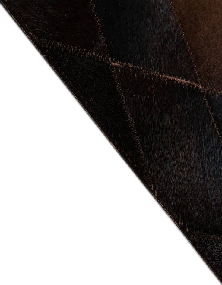 Detail image of  5' 2 x 8' Cowhide Stocks Rug