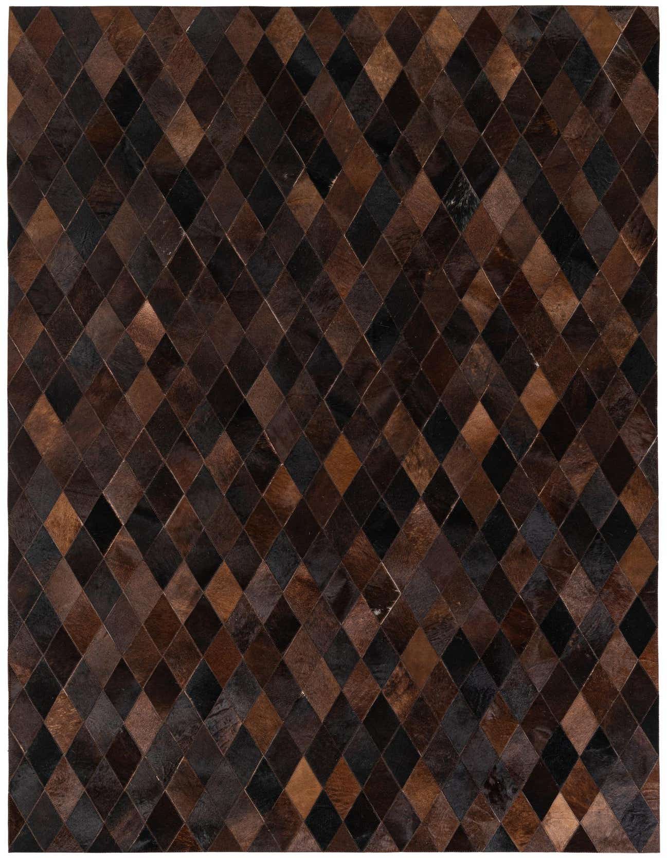 A 5x8 rectangular Cowhide Stocks rug from Rugs.com, featuring a modern diamond pattern in various shades of brown and tan.