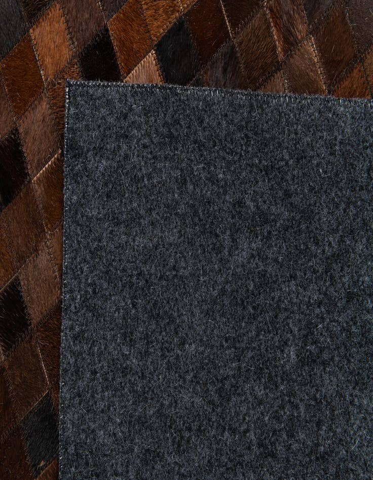 Detail image of  5' 1 x 7' 11 Cowhide Stocks Rug