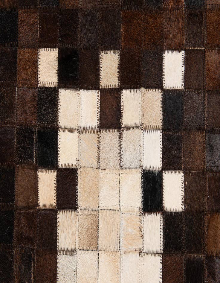 Detail image of  5' 1 x 8' 2 Cowhide Stocks Rug