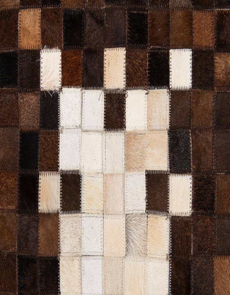 Detail image of  5' 1 x 8' Cowhide Stocks Rug
