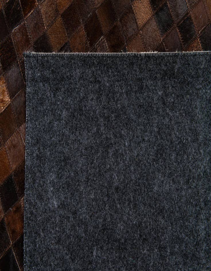 Detail image of  5' 1 x 8' Cowhide Stocks Rug