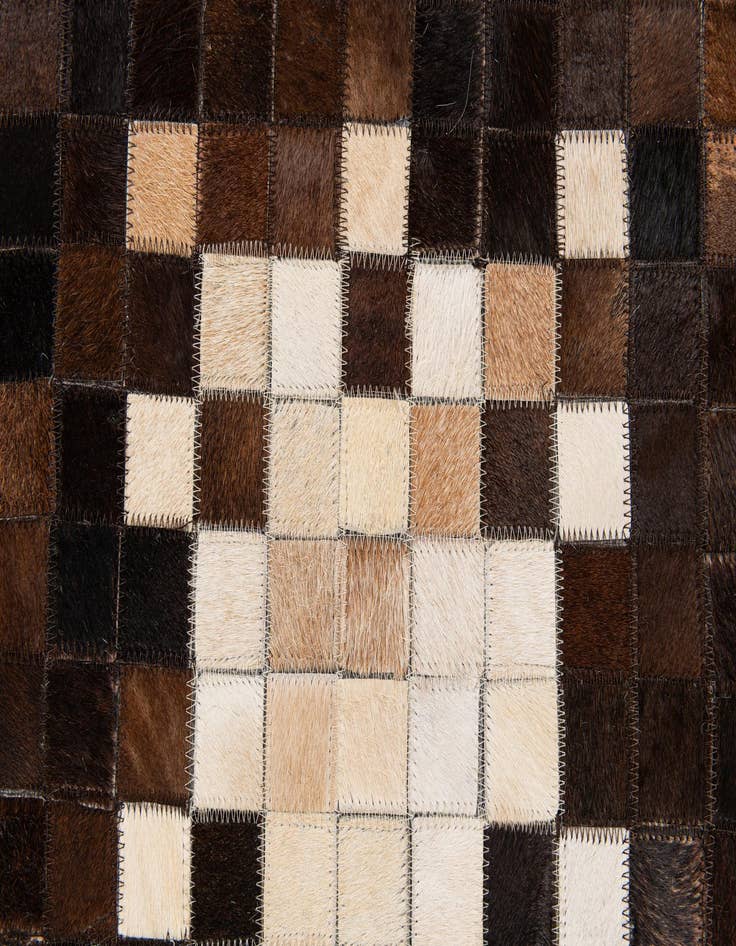 Detail image of  5' 3 x 8' Cowhide Stocks Rug
