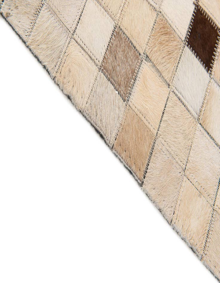 Detail image of  5' 2 x 8' Cowhide Stocks Rug