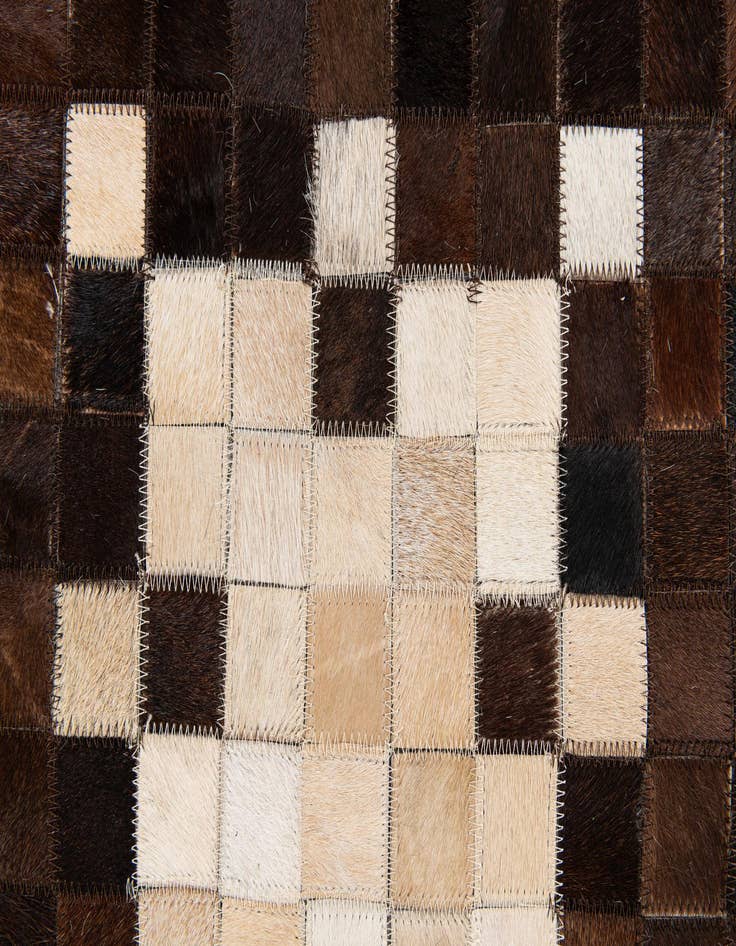 Detail image of  5' 2 x 8' Cowhide Stocks Rug