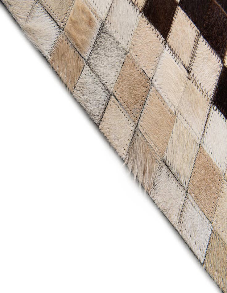 Detail image of  5' x 7' 11 Cowhide Stocks Rug
