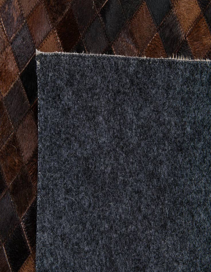 Detail image of  5' 1 x 8' 2 Cowhide Stocks Rug