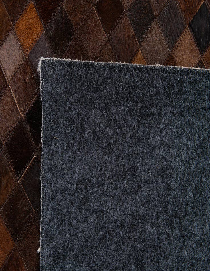 Detail image of  5' x 8' Cowhide Stocks Rug