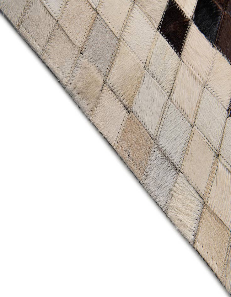 Detail image of  5' 1 x 7' 11 Cowhide Stocks Rug