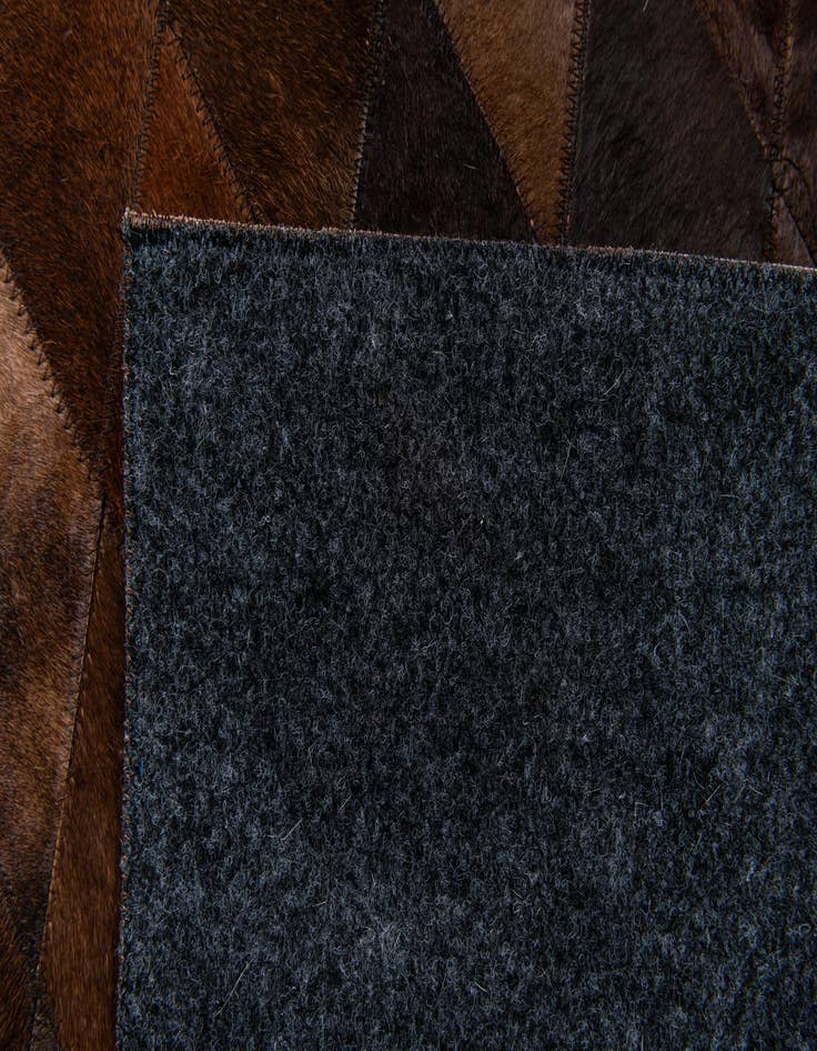 Detail image of  5' 7 x 7' 11 Cowhide Stocks Rug