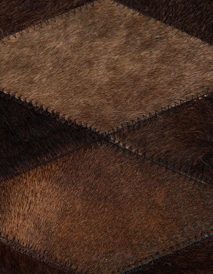 Detail image of  5' 7 x 7' 11 Cowhide Stocks Rug