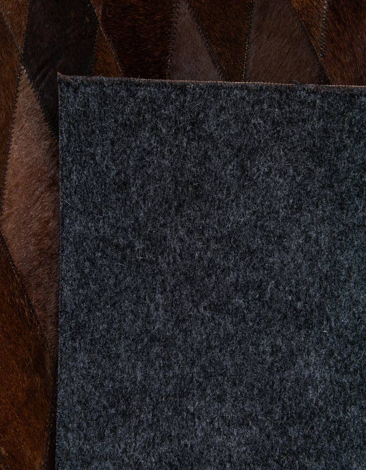 Detail image of  5' 7 x 7' 11 Cowhide Stocks Rug