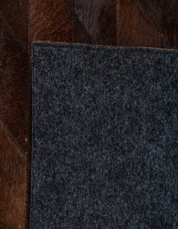 Detail image of  5' 7 x 7' 11 Cowhide Stocks Rug