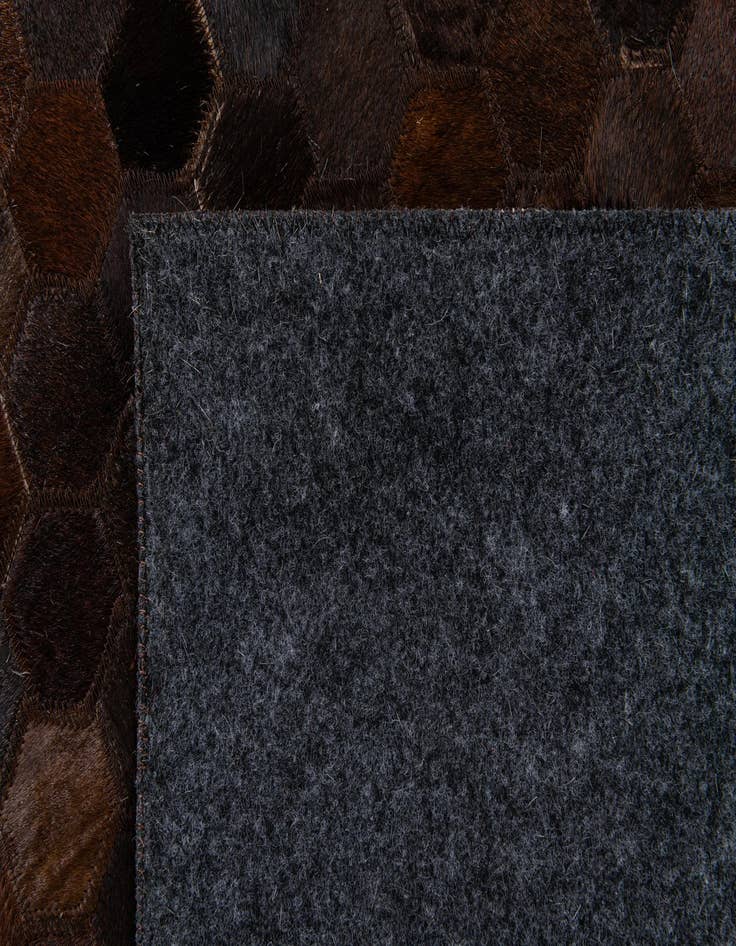 Detail image of  5' 1 x 7' 11 Cowhide Stocks Rug