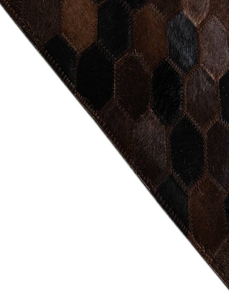 Detail image of  5' x 7' 11 Cowhide Stocks Rug