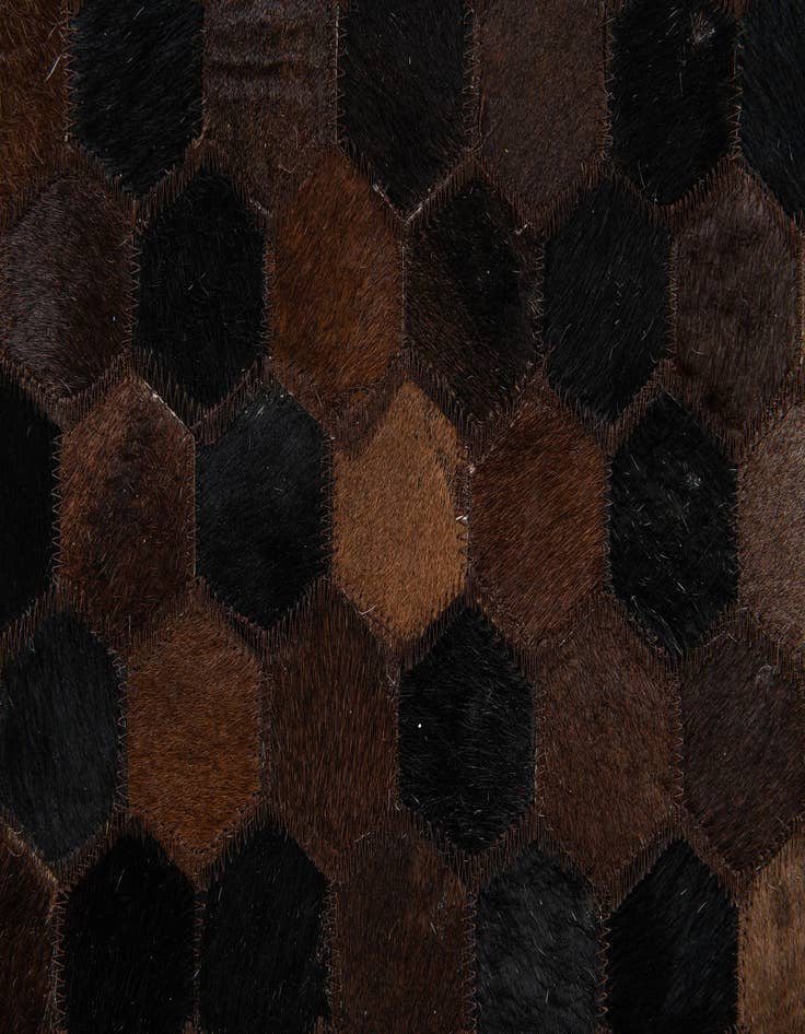 Detail image of  5' x 7' 11 Cowhide Stocks Rug
