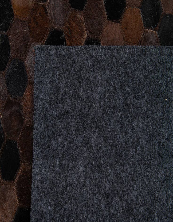 Detail image of  5' x 7' 11 Cowhide Stocks Rug