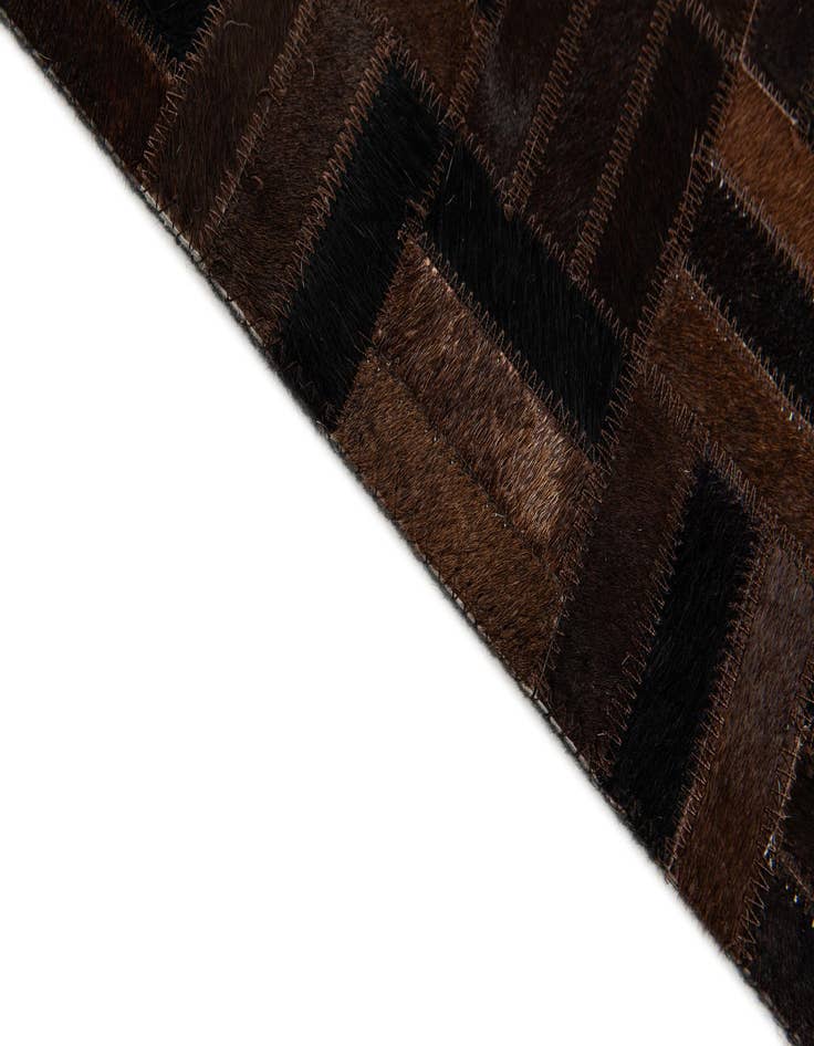 Detail image of  5' x 7' 11 Cowhide Stocks Rug
