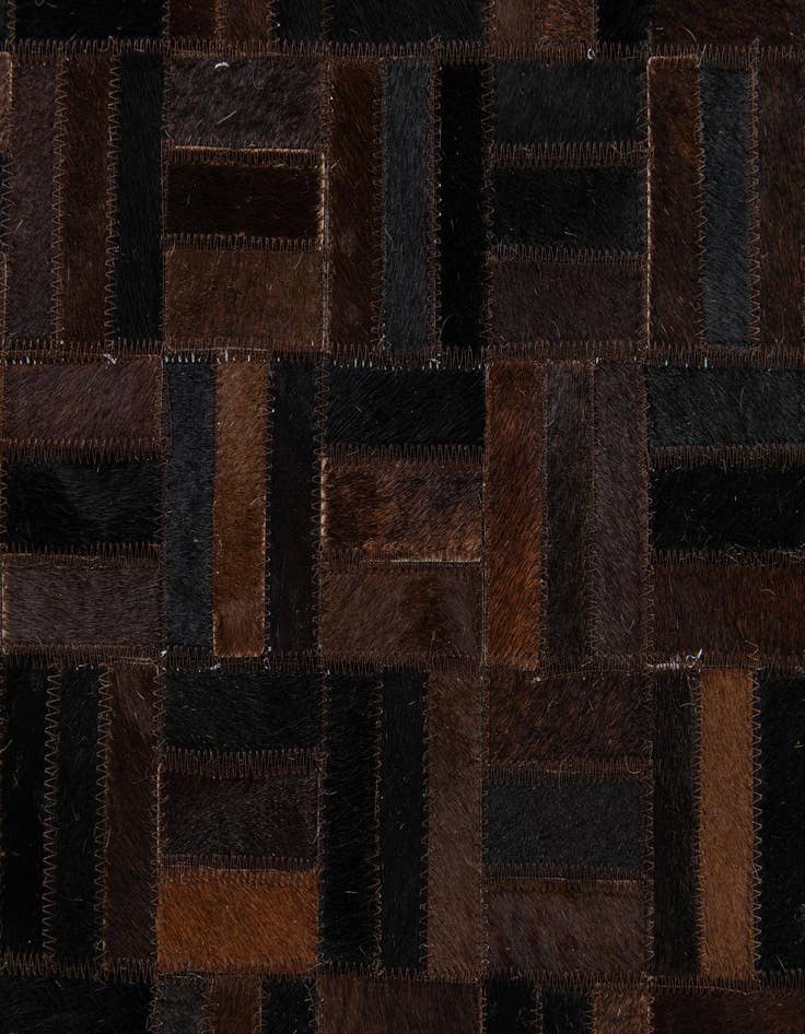 Detail image of  5' x 7' 11 Cowhide Stocks Rug