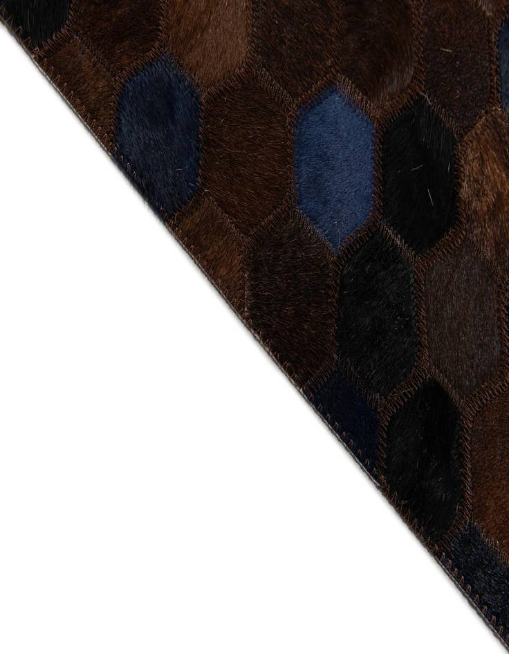 Detail image of  5' 1 x 7' 11 Cowhide Stocks Rug
