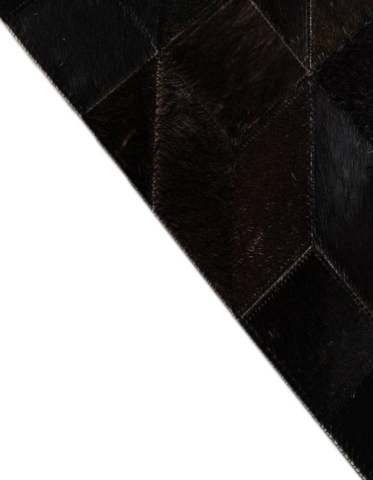 Detail image of  5' 2 x 8' Cowhide Stocks Rug