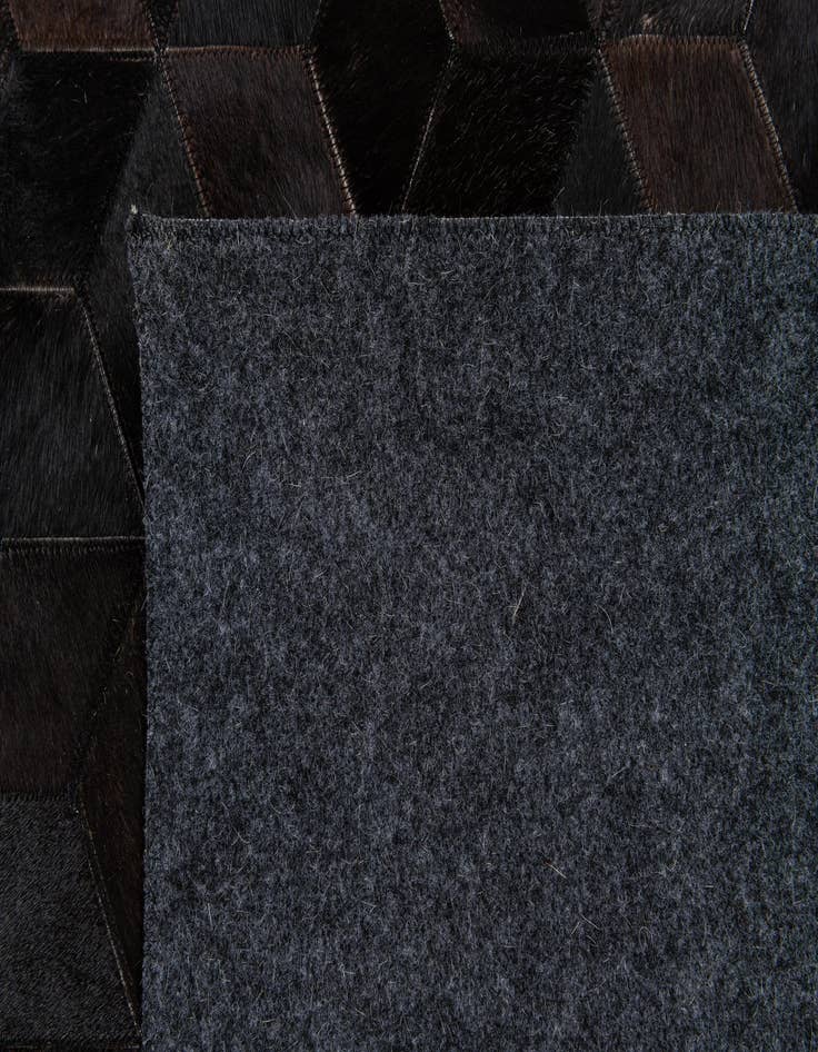 Detail image of  5' 2 x 8' Cowhide Stocks Rug