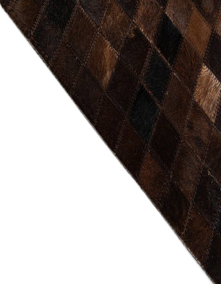 Detail image of  5' 1 x 8' Cowhide Stocks Rug