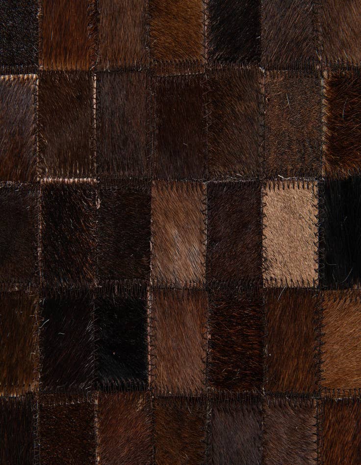 Detail image of  5' 1 x 8' Cowhide Stocks Rug