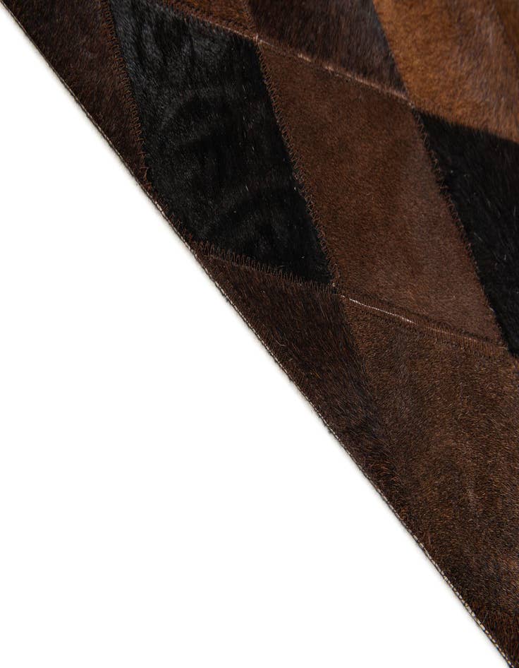 Detail image of  4' 11 x 7' 11 Cowhide Stocks Rug