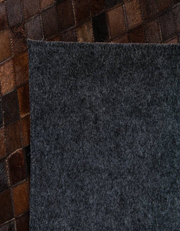 Detail image of  5' 2 x 7' 10 Cowhide Stocks Rug