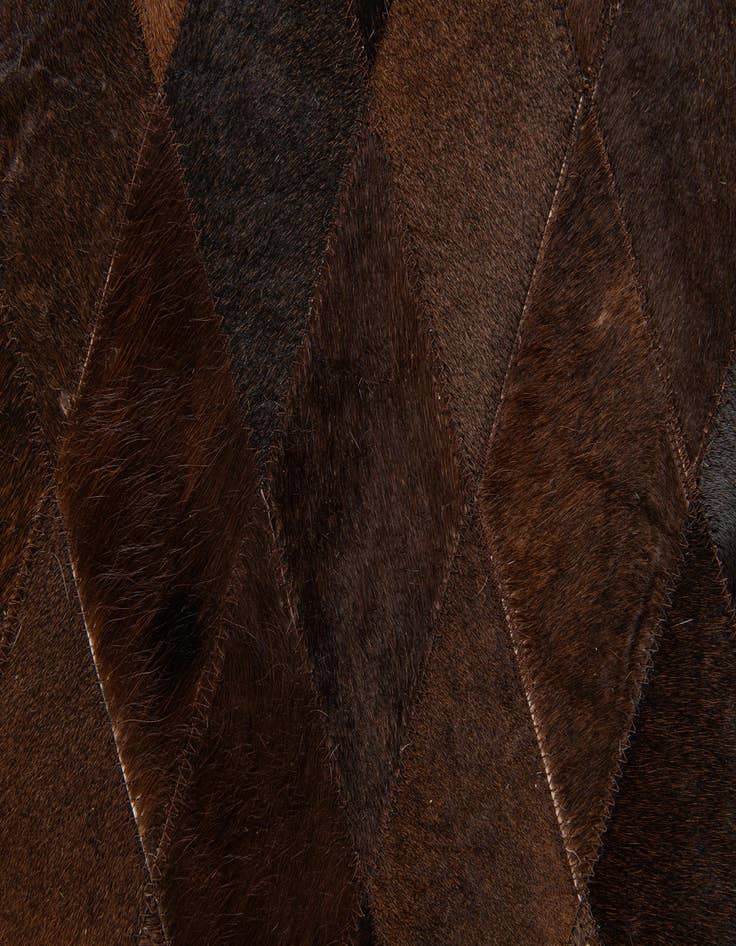 Detail image of  5' 2 x 7' 11 Cowhide Stocks Rug