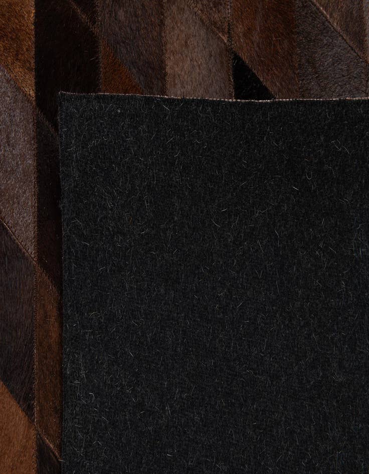 Detail image of  5' 2 x 7' 11 Cowhide Stocks Rug