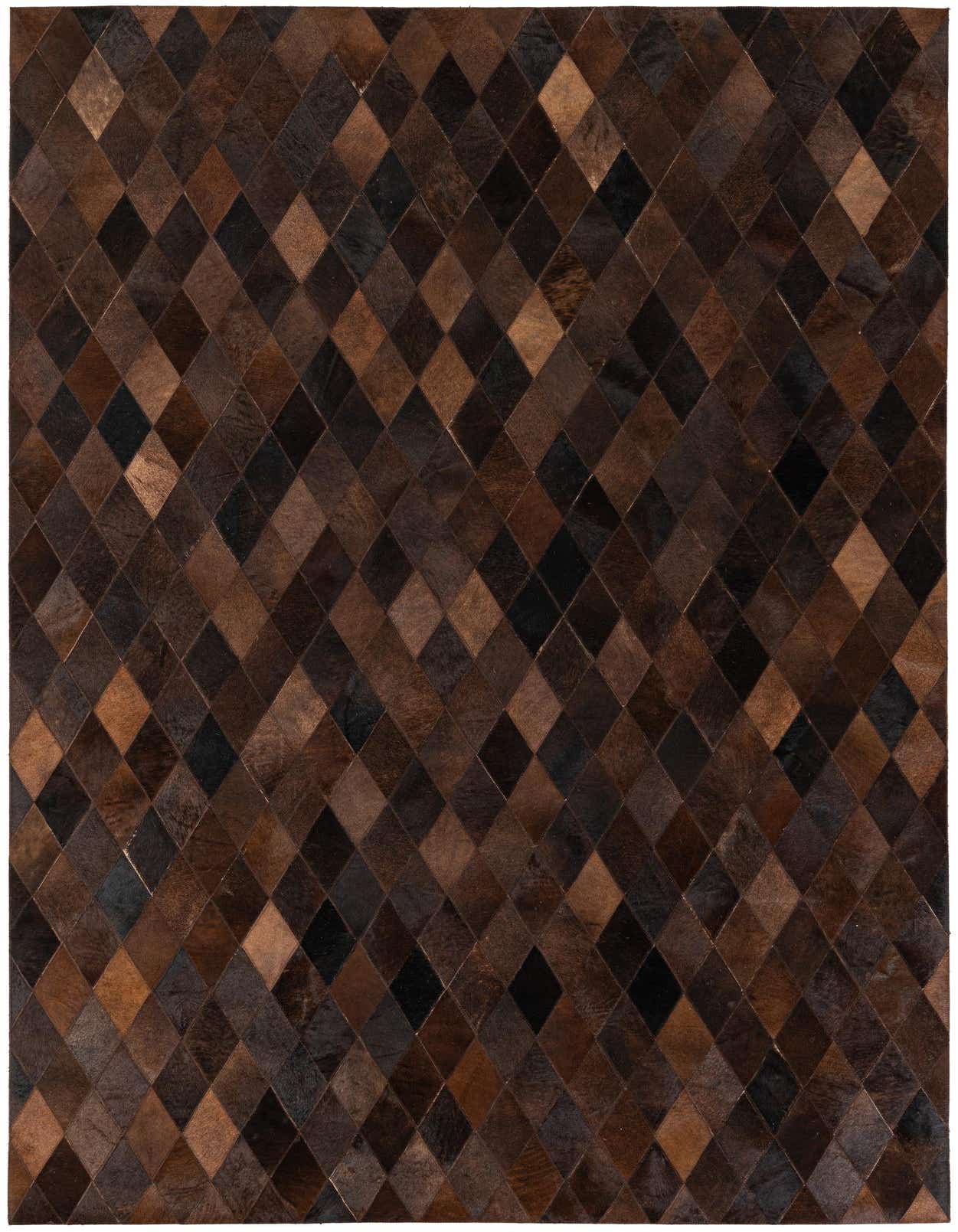 A 5x8 rectangular modern area rug featuring a mosaic of diamond-shaped cowhide patches in varying shades of brown and tan.