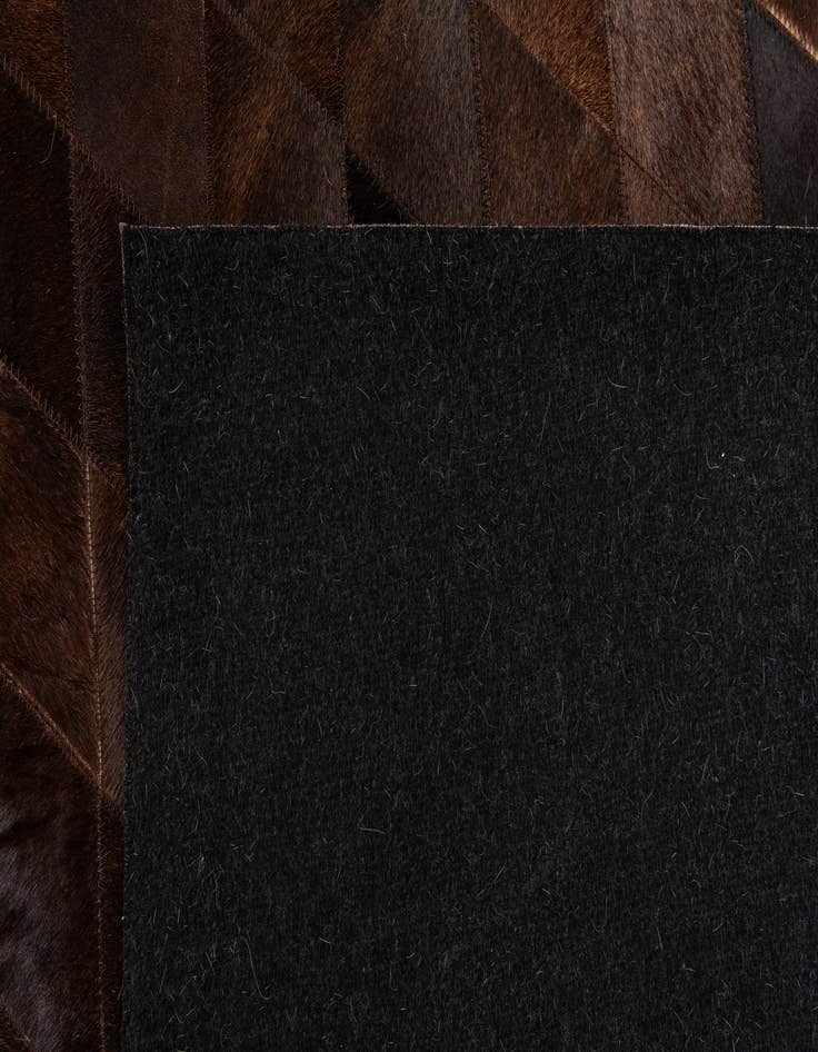 Detail image of  5' 2 x 7' 11 Cowhide Stocks Rug