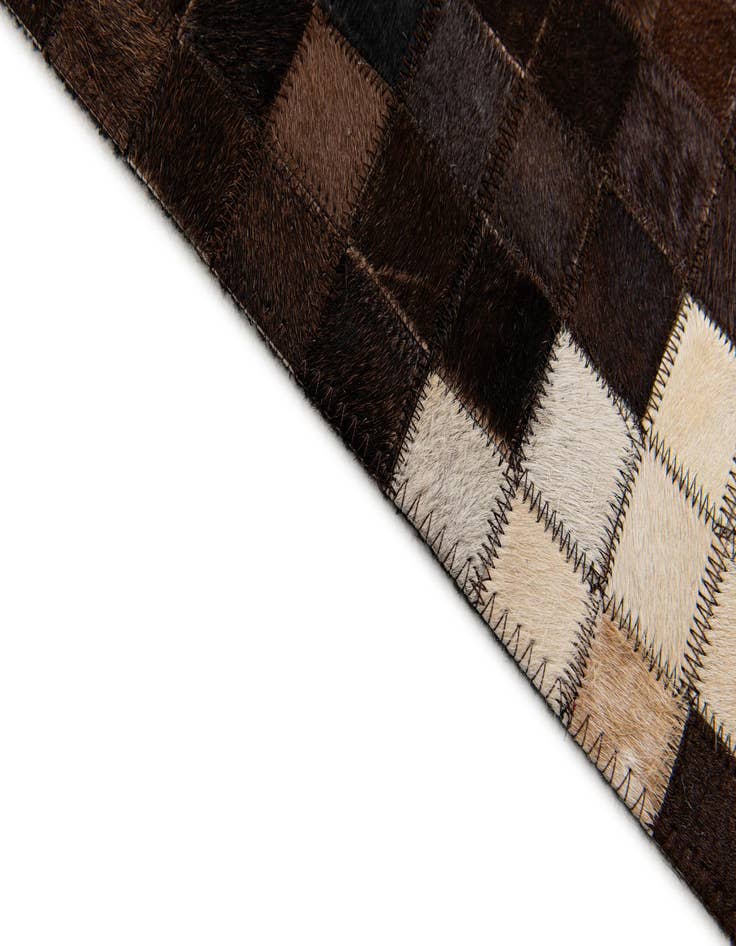 Detail image of  5' 1 x 8' 3 Cowhide Stocks Rug