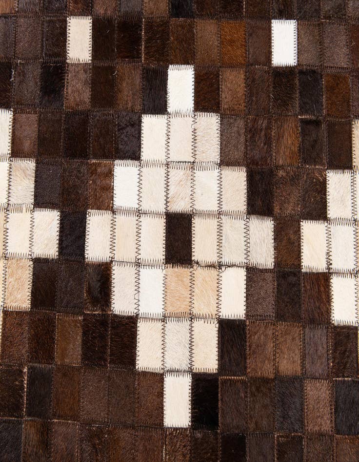 Detail image of  5' 1 x 8' 3 Cowhide Stocks Rug