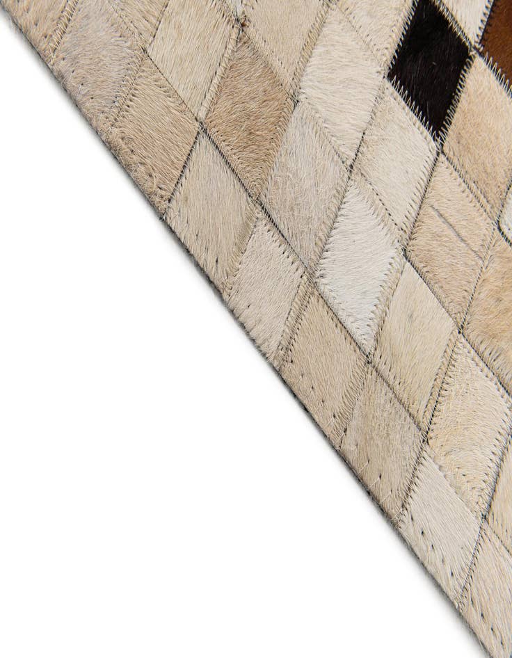 Detail image of  5' x 7' 11 Cowhide Stocks Rug