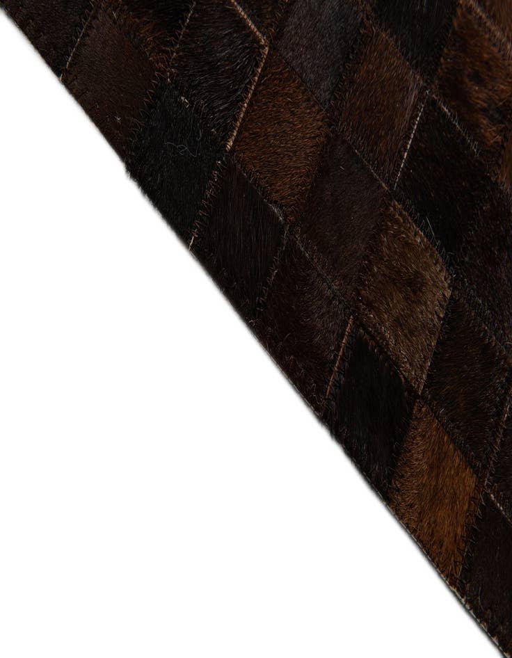 Detail image of  5' 1 x 8' Cowhide Stocks Rug