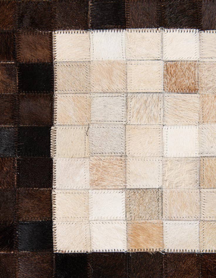 Detail image of  5' 1 x 8' Cowhide Stocks Rug