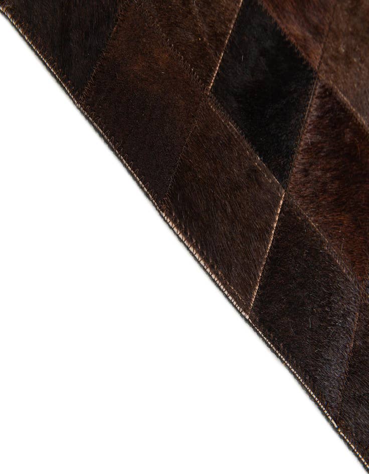 Detail image of  5' 2 x 8' Cowhide Stocks Rug