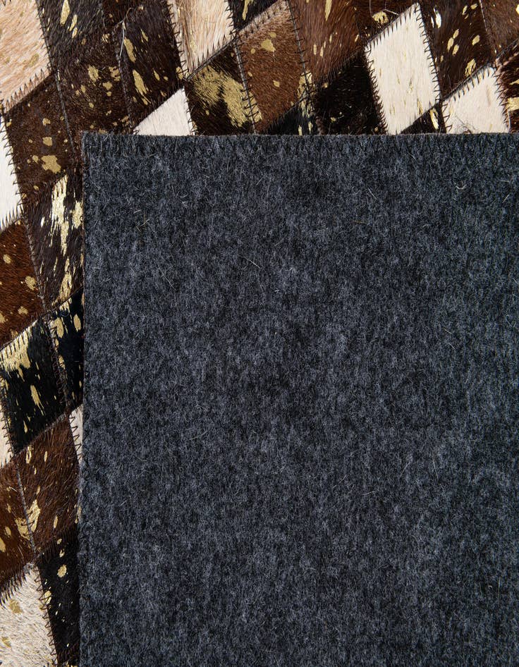 Detail image of  5' x 7' 10 Cowhide Stocks Rug