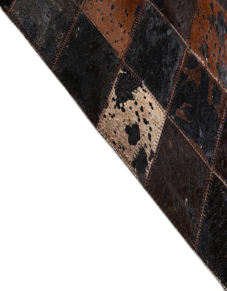 Detail image of  5' 1 x 8' 1 Cowhide Stocks Rug