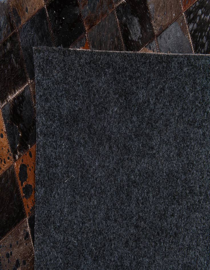 Detail image of  5' 1 x 8' 1 Cowhide Stocks Rug