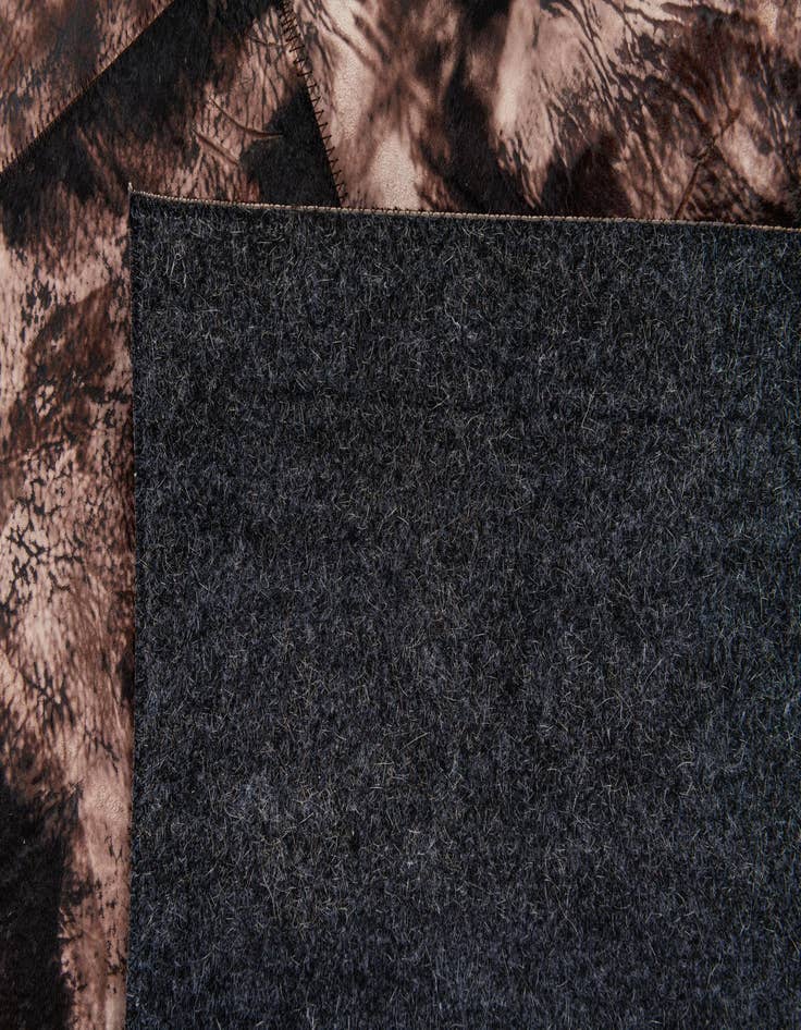 Detail image of  5' 2 x 8' 1 Cowhide Stocks Rug