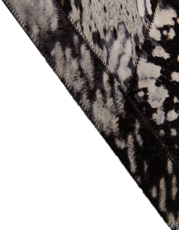 Detail image of  5' 2 x 8' Cowhide Stocks Rug