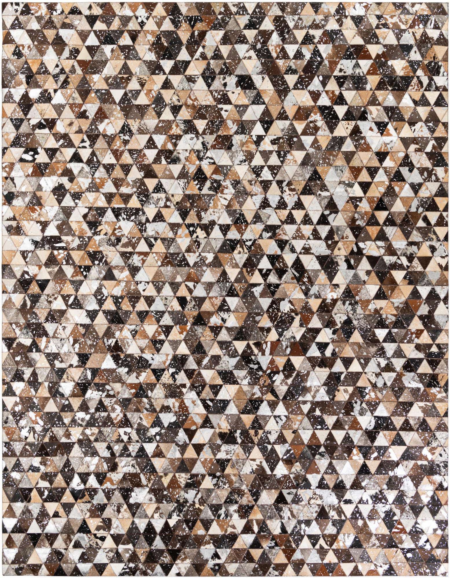 A rectangular 8x10 modern cowhide rug featuring a geometric pattern of brown, tan, black, and white triangular patches.