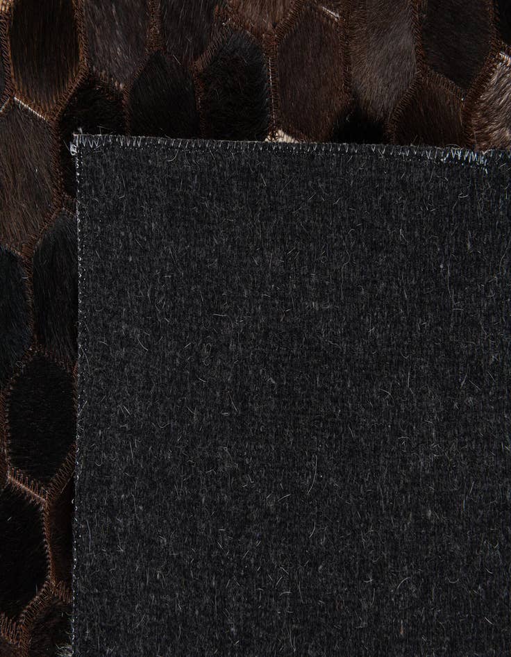 Detail image of  7' 11 x 10' Cowhide Stocks Rug